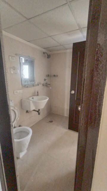 Bathroom in 3 BHK Apartment at Aditya Celebrity Homes, Sector 76 – for Rent