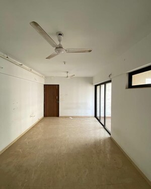 Living Room in 2 BHK Apartment at Lodha Lakeshore Greens, Dombivli East – for Sale