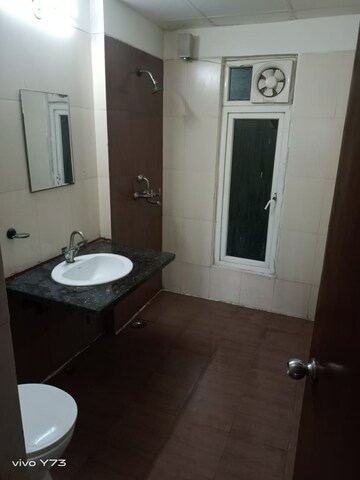 Bathroom in 2.5 BHK Apartment at Unnati Fortune The Aranya, Sector 119 – for Rent