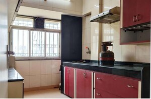 Kitchen in 2 BHK Apartment at Satellite Garden, Goregaon East – for Sale