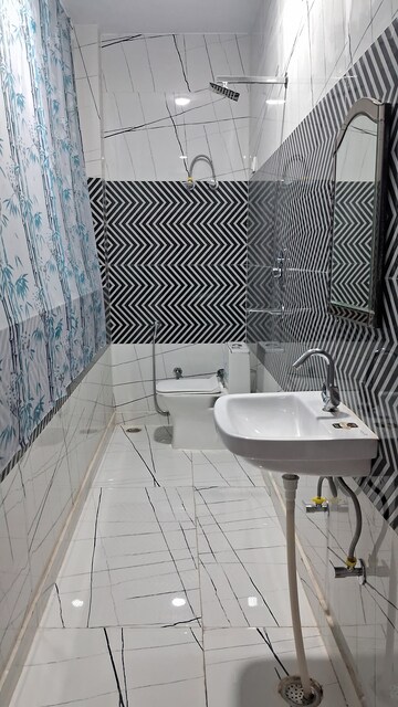 Bathroom in 4 BHK Builder Floor at Rajouri Garden – for Rent