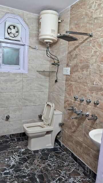 Bathroom in 4 BHK Builder Floor at Rajouri Garden – for Rent