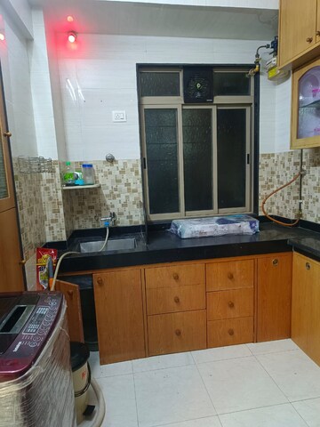 Kitchen in 1 BHK Apartment at Jyoti Complex, Goregaon East – for Sale