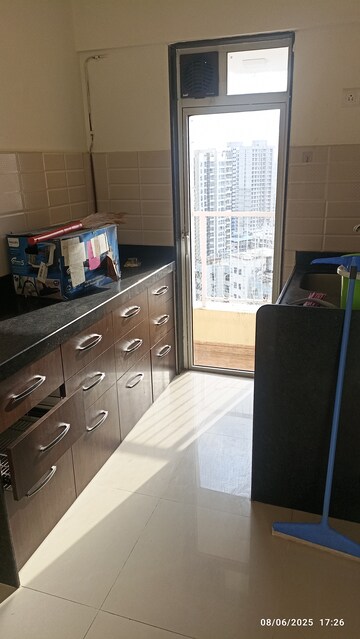 Kitchen in 1.5 BHK Apartment at JP North Imperia, Mira Road – for Rent