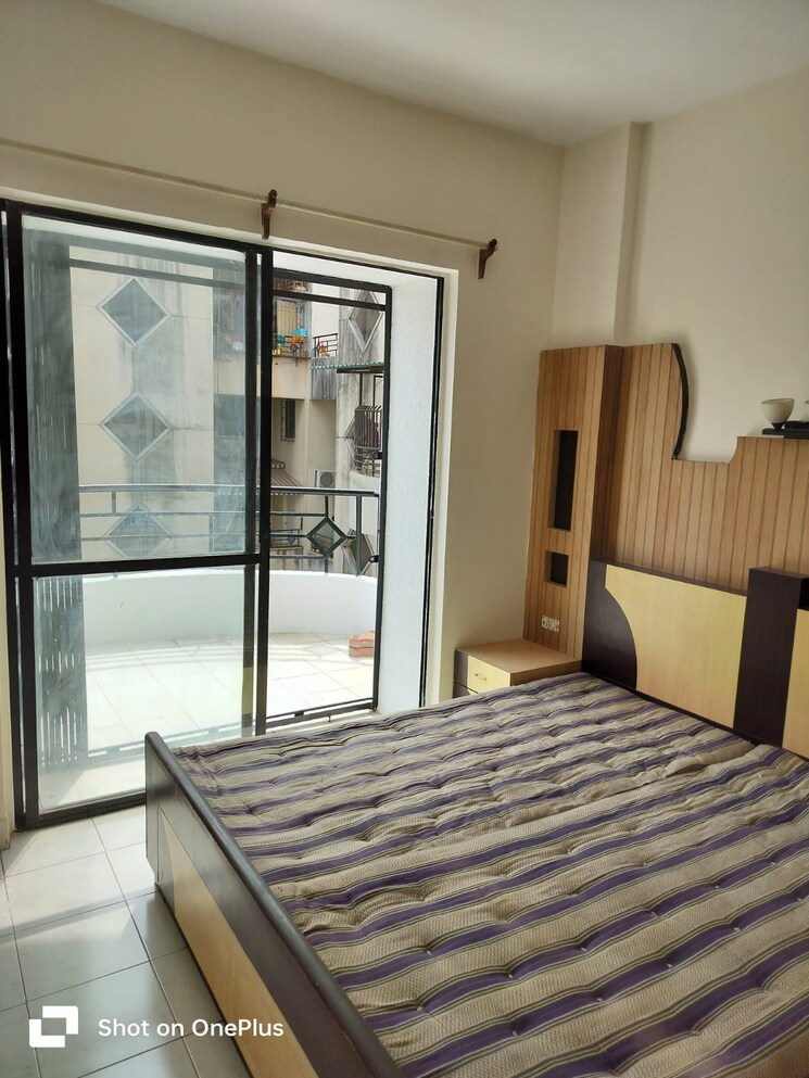 Bedroom, rahul-park-d1-d2-d3-building 2 Bedroom 1100 Sq.Ft. Apartment In Warje Pune 8796368