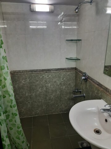 Bathroom in 3 BHK Apartment at Grant Road East – for Rent