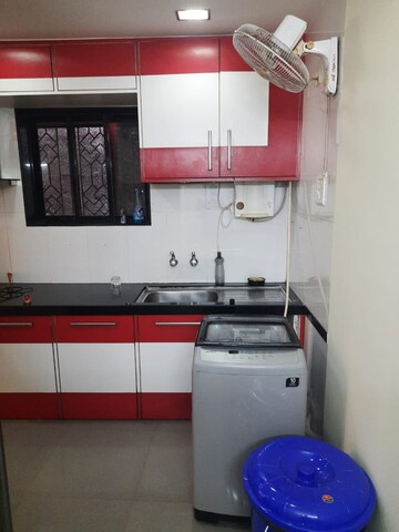Kitchen in 3 BHK Apartment at Grant Road East – for Rent