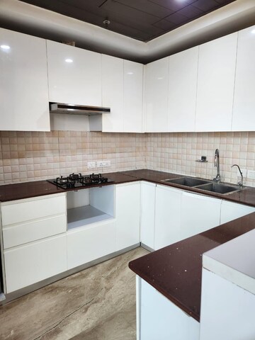 Kitchen in 3 BHK Apartment at Supertech Supernova Nova Residences, Sector 94 – for Rent