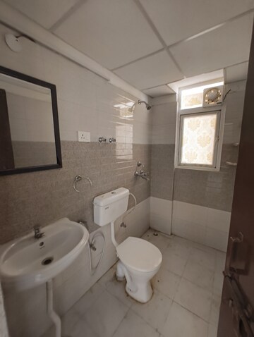 Bathroom in 2 BHK Apartment at Signature Global Orchard Avenue, Sector 93 – for Sale
