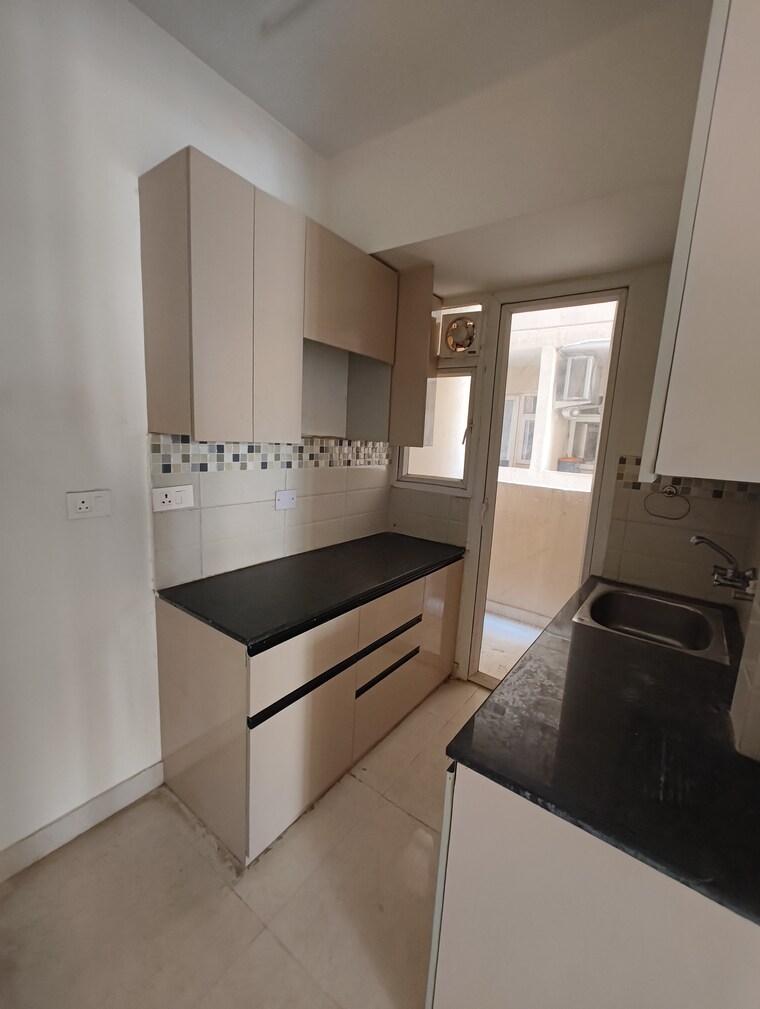 Kitchen, signature-global-orchard-avenue 2 Bedroom 577 Sq.Ft. Apartment In Sector 93 Gurgaon 8796482