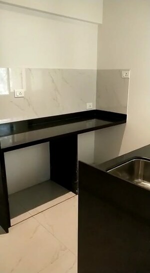 Kitchen in 1 BHK Apartment at Runwal Gardens Phase 4, Dombivli East – for Sale