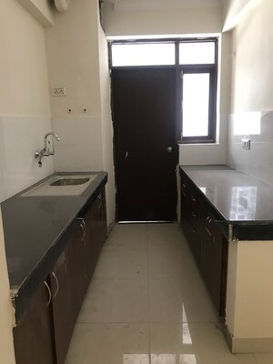 Kitchen in 3 BHK Apartment at Cosmos Express 99, Gopalpur – for Sale