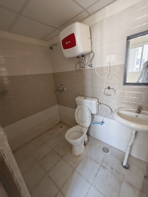 Bathroom in 2 BHK Apartment at Signature Global Orchard Avenue, Sector 93 – for Sale