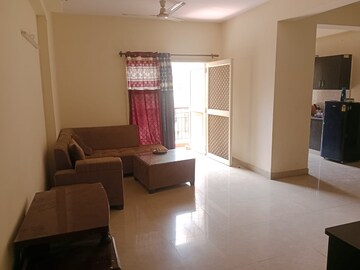 Living Room in 2 BHK Apartment at Aims Golf City, Sector 75 – for Rent