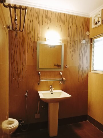Bathroom in 3 BHK Apartment at Vasant Kunj – for Rent