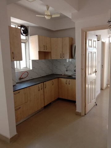 Kitchen in 2 BHK Apartment at Supertech Cape Town, Sector 74 – for Sale