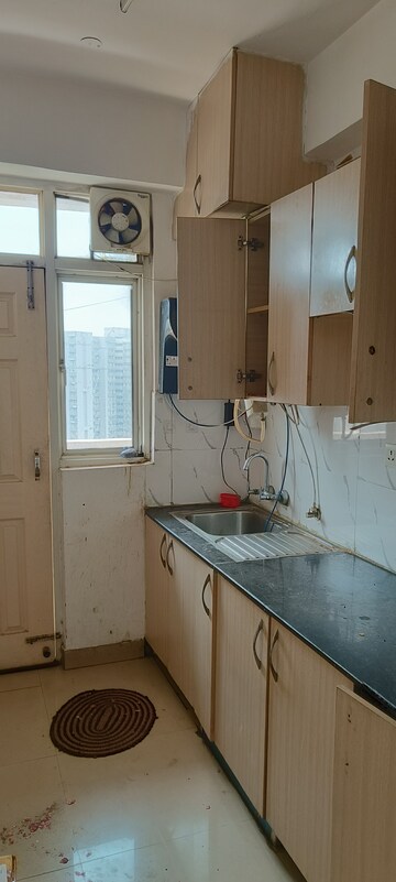 Kitchen in 2 BHK Apartment at Supertech Cape Town, Sector 74 – for Sale