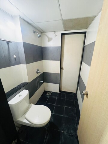 Bathroom in 2 BHK Apartment at Paranjape Schemes Blue Ridge, Hinjewadi – for Rent