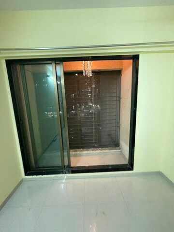 Room in 2 BHK Apartment at Shree Satya Shankar Residency, Manpada – for Rent