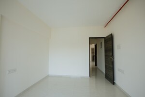 Room in 2 BHK Apartment at Rashi Tower, Goregaon East – for Sale