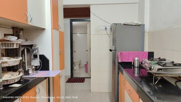 Kitchen in 2 BHK Apartment at RNA Corp Hills, Andheri East – for Sale