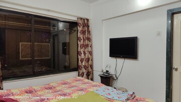 Living Room in 2 BHK Apartment at RNA Corp Hills, Andheri East – for Sale