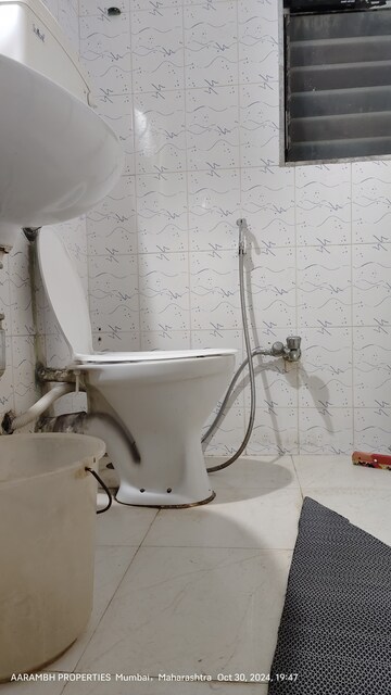 Bathroom in 2 BHK Apartment at RNA Corp Hills, Andheri East – for Sale