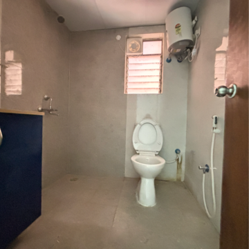 Bathroom in 2 BHK Apartment at Siddha Happyville, Reekjoyoni Rajarhat – for Rent