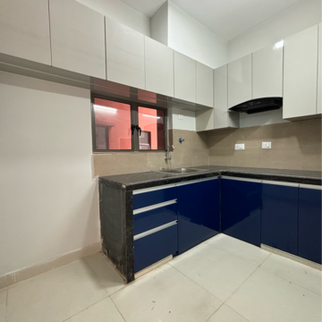 Kitchen in 2 BHK Apartment at Siddha Happyville, Reekjoyoni Rajarhat – for Rent
