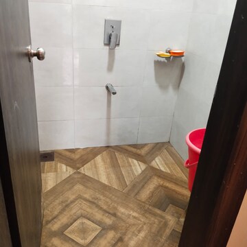 Bathroom in 1 BHK Apartment at Shree Tirupati STG Signature Residency, Thane West – for Rent