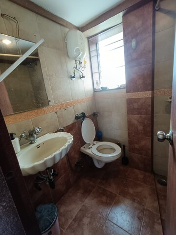 Bathroom in 2 BHK Apartment at Mandar Apartments, Andheri West – for Rent