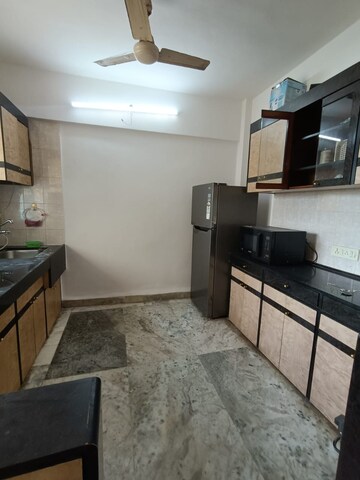 Kitchen in 2 BHK Apartment at Mandar Apartments, Andheri West – for Rent