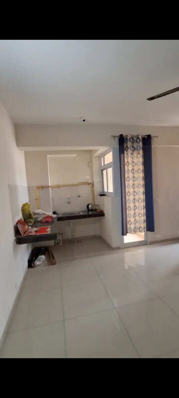 Living Room in 1 BHK Apartment at Wave Dream Homes, Wave City – for Rent