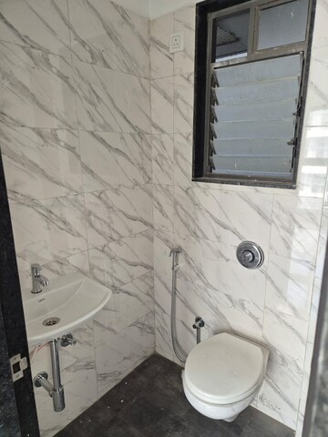 Bathroom in 1 BHK Apartment at UK Iridium, Kandivali East – for Rent