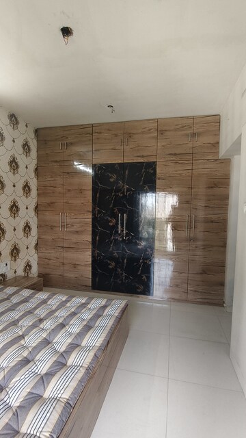 Bedroom in 2 BHK Apartment at Abhiram CHS, Kandivali West – for Rent