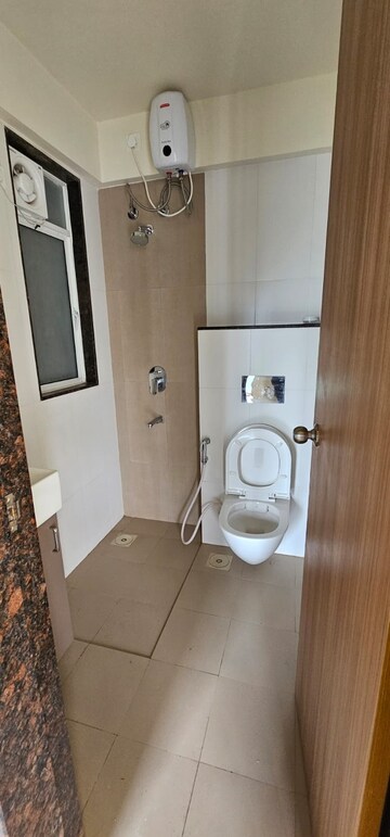 Bathroom in 1 BHK Apartment at Godrej Tranquil, Kandivali East – for Rent