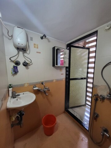 Master Bedroom in 1 BHK Apartment at Goregaon West – for Sale