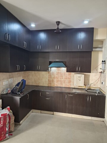 Kitchen in 3 BHK Apartment at Aims Golf City, Sector 75 – for Sale