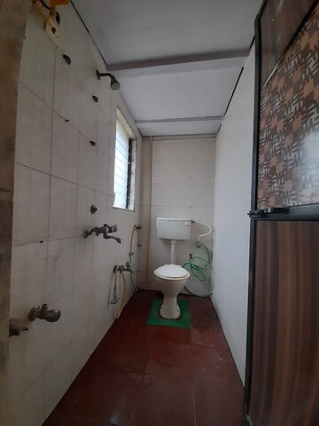 Bathroom in 1 BHK Apartment at AMI Jharna, Goregaon East – for Rent
