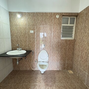 Bathroom in 2 BHK Apartment at Kolte Patil Cheryl, Kharadi – for Rent