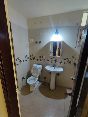 Bathroom in 3.5 BHK Apartment at Prateek Wisteria, Sector 77 – for Sale