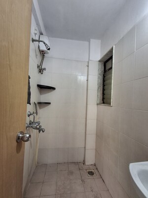 Bathroom in 1 BHK Apartment at Evershine Millennium Paradise, Kandivali East – for Sale