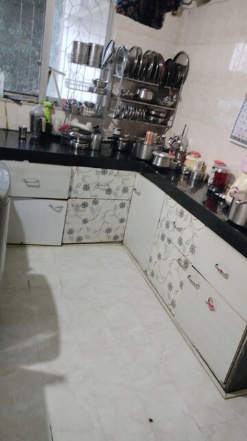 Kitchen in 2 BHK Apartment at Jaswant Park, Andheri East – for Sale
