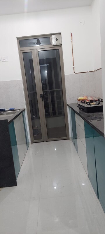 Kitchen in 2 BHK Apartment at Kalpataru Paramount, Kapur Bawdi – for Rent