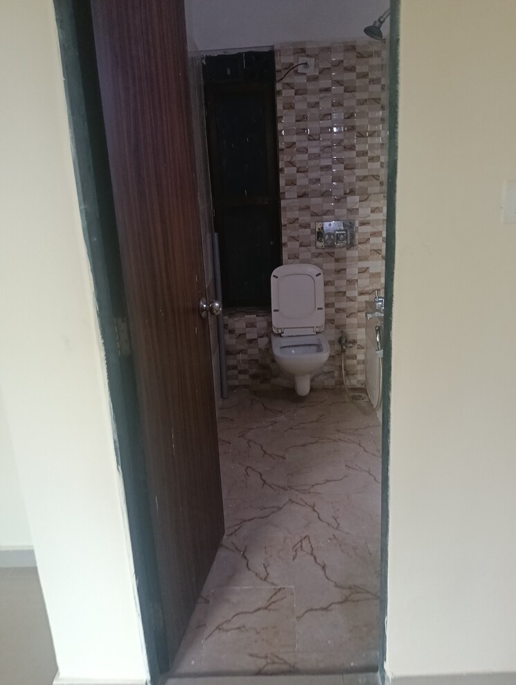 Bathroom, man-opus 2 Bedroom 692 Sq.Ft. Apartment In Mira Road Thane 8797652