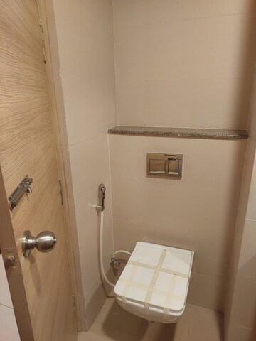 Bathroom in Studio Apartment at Gaur City Mall, Sector 4 Greater Noida – for Sale