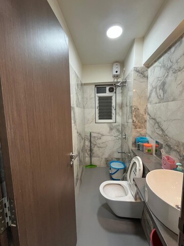Bathroom in 2 BHK Apartment at Satellite Garden, Goregaon East – for Rent
