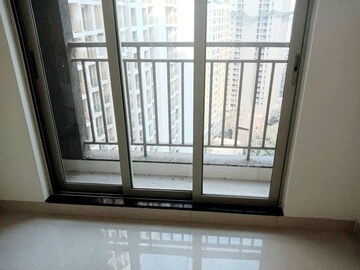 Room in 2 BHK Apartment at Ashar Metro Towers, Vartak Nagar – for Sale