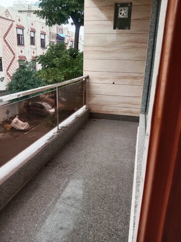 Balcony in 1.5 BHK Builder Floor at Palm Height, Bisrakh Jalalpur – for Rent