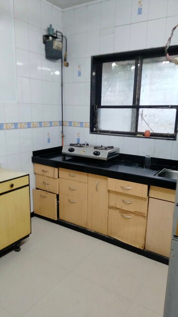 Kitchen in 1 BHK Apartment at STC Employees CHS, Andheri East – for Rent